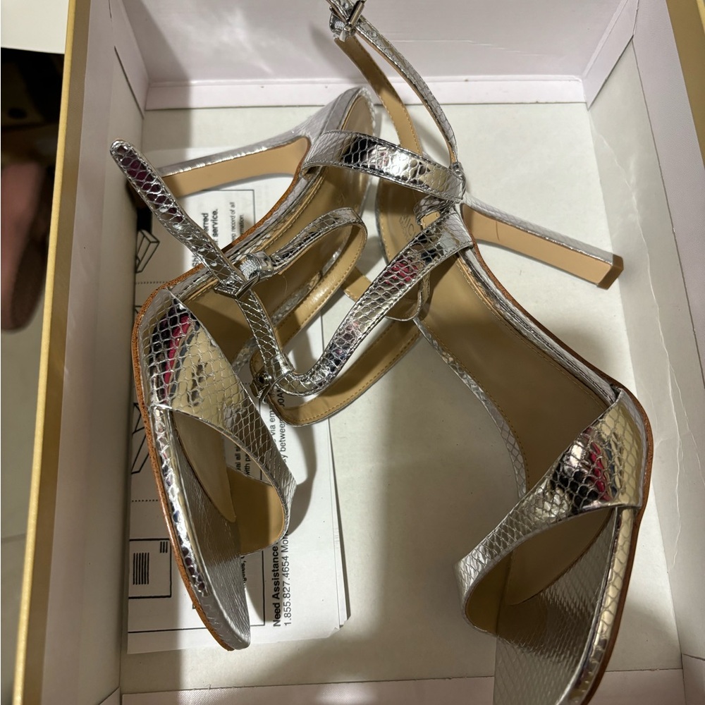 Michael kors silver heels new. Size 7.5